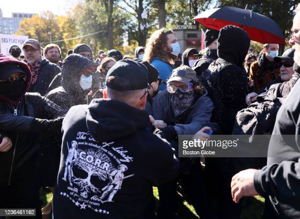 CORR members attack counterprotesters in a tight crowd